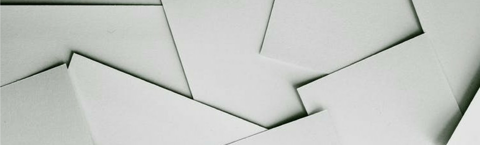 A stack of papers for kicking the paper habit and using Fingercheck online time clock software.