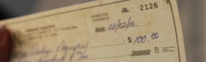 Signed paycheck that leads to songs about payday.