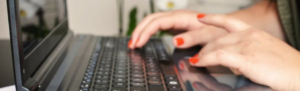 Business owner using HR tool on FingerCheck.