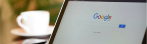 Google page on laptop in daylight outside, reflecting the new autofill capabilities for locations within Fingercheck powered by Google.