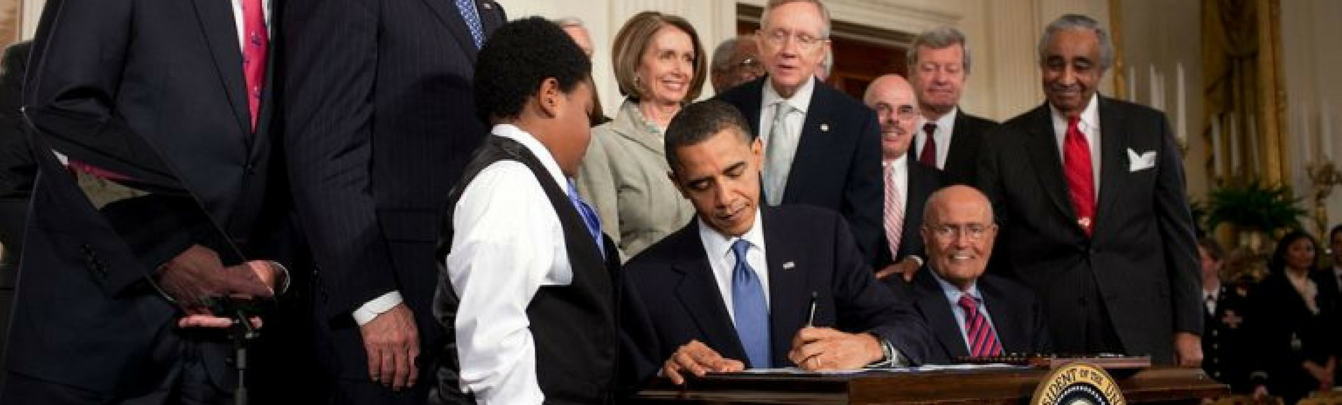 Obama Signs papers