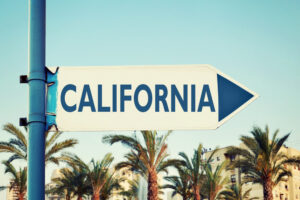 California sign pointing to payroll with FingerCheck360.