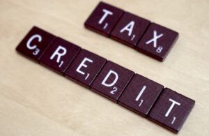 Tax credit spelled out in scrabble letters.