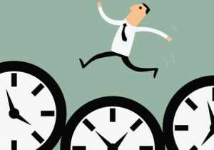 Illustration in flat style of businessman hopping over three time clocks signifying acing time and attendance with FingerCheck tips and tools.