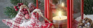 Beautiful red lantern with star Christmas ornaments in snow, lighting the way for small business owners to heed Fingercheck holiday tips.