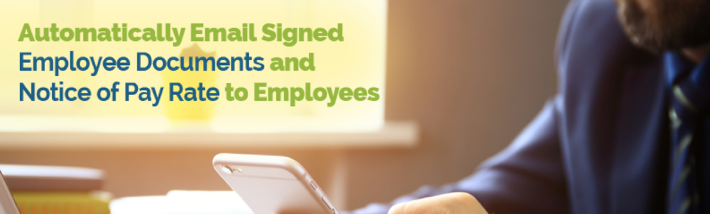 Businessman's hands up close, typing while looking at phone checking that the signed forms and NYS notice of pay rate have been sent through Fingercheck Payroll.