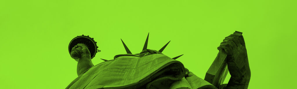 Close-up of Statue of Liberty's crown symbolizing liberty as New York bans employers from asking job applicants about pay history.