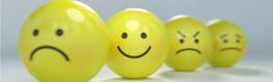 Smileys ranging across different moods symbolizing the emotions of workers looking to get what's owed for working on public holidays.