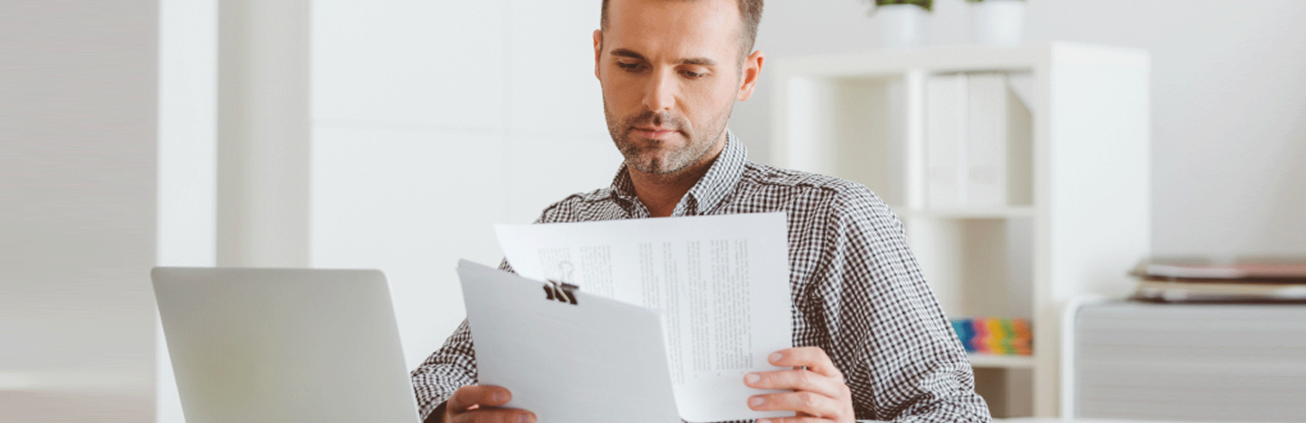 guy reading documents